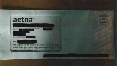 A photo of the Aetna letter seen through an envelope's window.