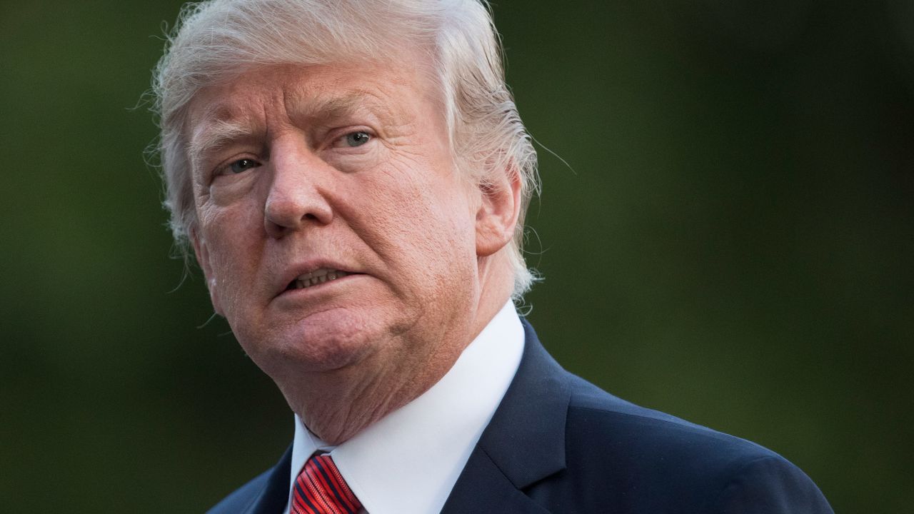 FILE - In this Aug. 23, 2017 file photo, President Donald Trump walks on the South Lawn of the White House in Washington. The president lashed out at Republican leaders in Congress, suggesting efforts to increase the country's borrowing limit to avoid an economic-rattling default on the nation's debt are "a mess!" (AP Photo/Carolyn Kaster)