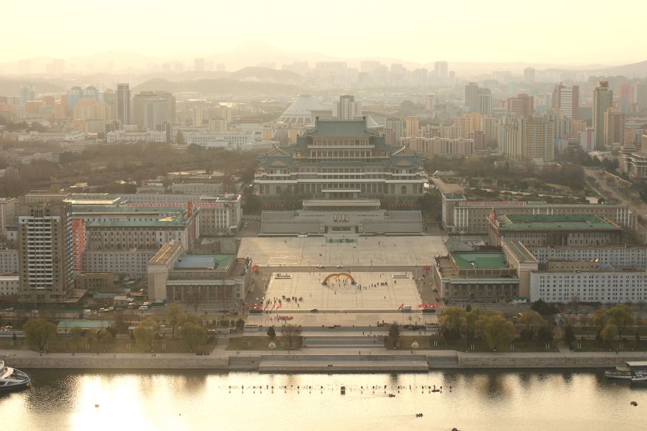 <strong>Lay of the land:</strong> Most travelers flying to North Korea begin the experience in the capital, Pyongyang. The city's Juche Tower provides a bird's-eye view of Kim Il Sung Square -- where military parades typically take place.