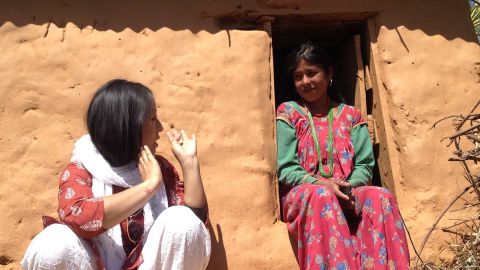 Menstrual Hygiene activist Pema Lakhi interacting with a local woman in Achham district of Nepal.