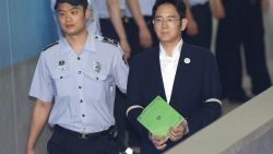 Lee Jae-yong (front R), vice chairman of Samsung Electronics Co., arrives for his trial at the Seoul Central District Court in Seoul on August 7, 2017.
South Korean prosecutors on August 7 demanded the heir to the Samsung empire be jailed for 12 years over his role in the corruption scandal that brought down the country's last president. / AFP PHOTO / POOL / Ahn Young-joon        (Photo credit should read AHN YOUNG-JOON/AFP/Getty Images)