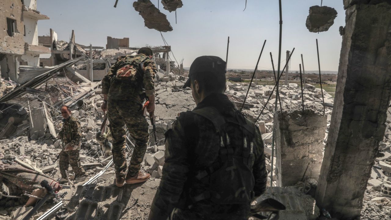 SDF forces advance through west Raqqa, where the threat of ISIS snipers is never far.