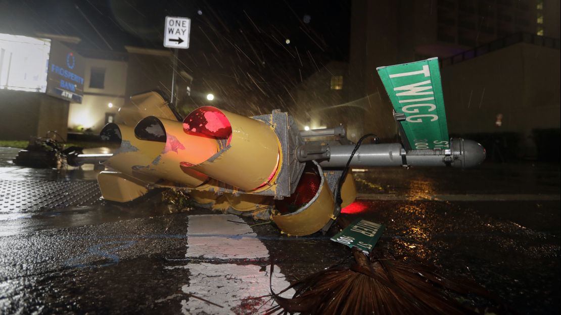 A downed traffic signal lies in a street in Corpus Christi, Texas, on August 26.