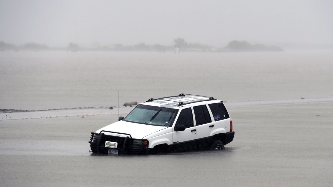 A car is stranded in floodwaters on August 26 after Hurricane Harvey hit Corpus Christi, Texas.