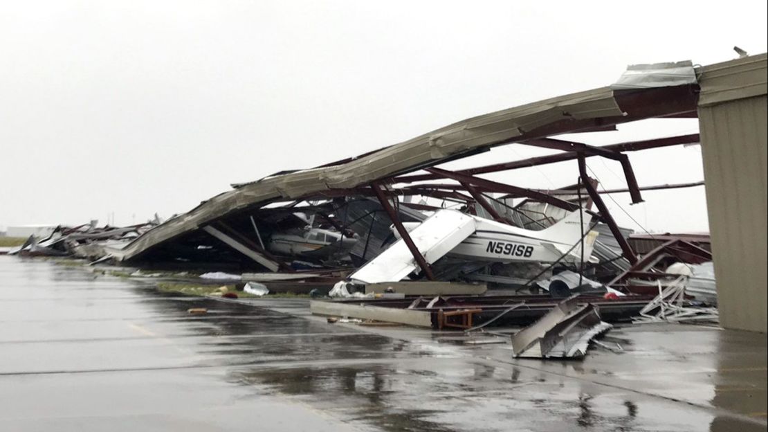 A small plane sits damaged in a destroyed hangar August 26 after Hurricane Harvey hit Rockport.