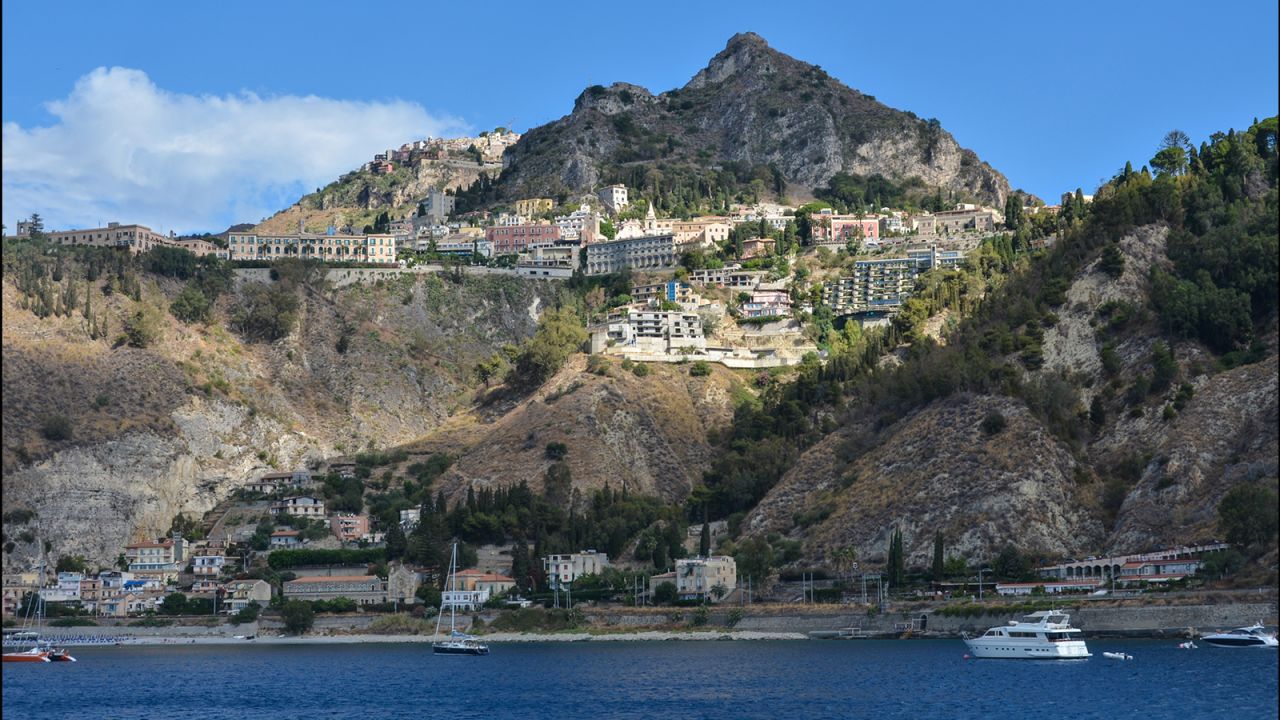 <strong>Taormina, Sicily, Italy: </strong>Dazzling vistas, the vast Teatro Antico -- Sicily's second largest Greek theater -- as well as views of the smoldering Mount Etna and the boutique-filled Corso Umberto I all help make Taormina one of Italy's most special hilltop towns.
