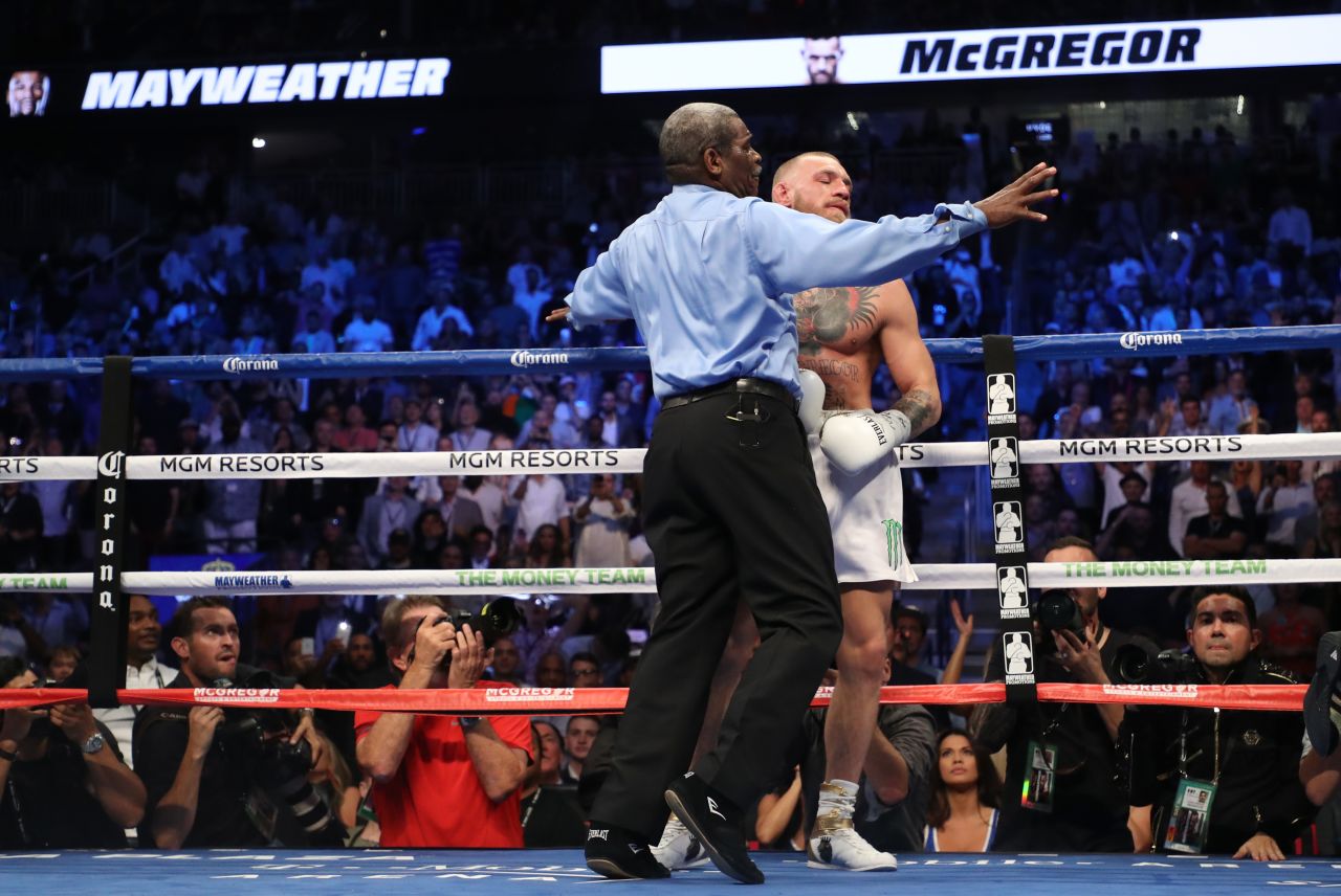 Referee Robert Byrd stopped the fight in the 10th after a wobbly McGregor took several hard shots and wasn't throwing punches. 