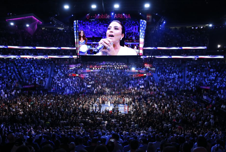Demi Lovato sang the national anthem before the fight.