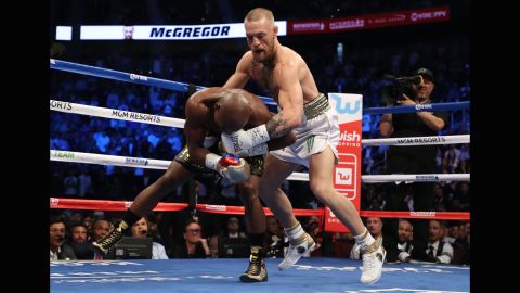 There were several awkward exchanges when McGregor would end up behind Mayweather.
