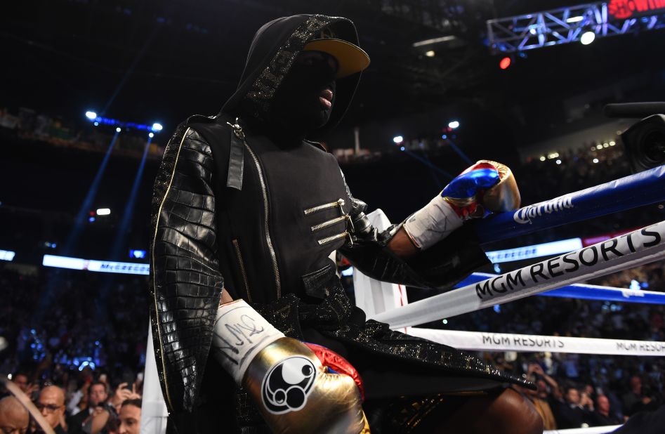 Mayweather came out in all black and wore a mask.