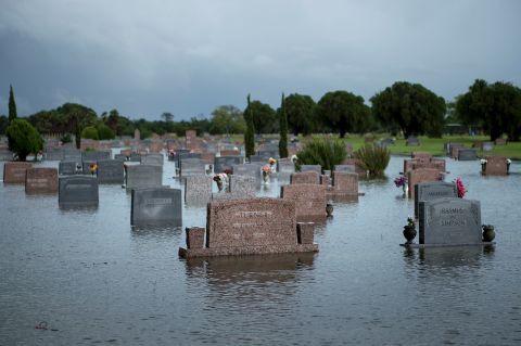 A graveyard is flooded in Pearland, Texas.