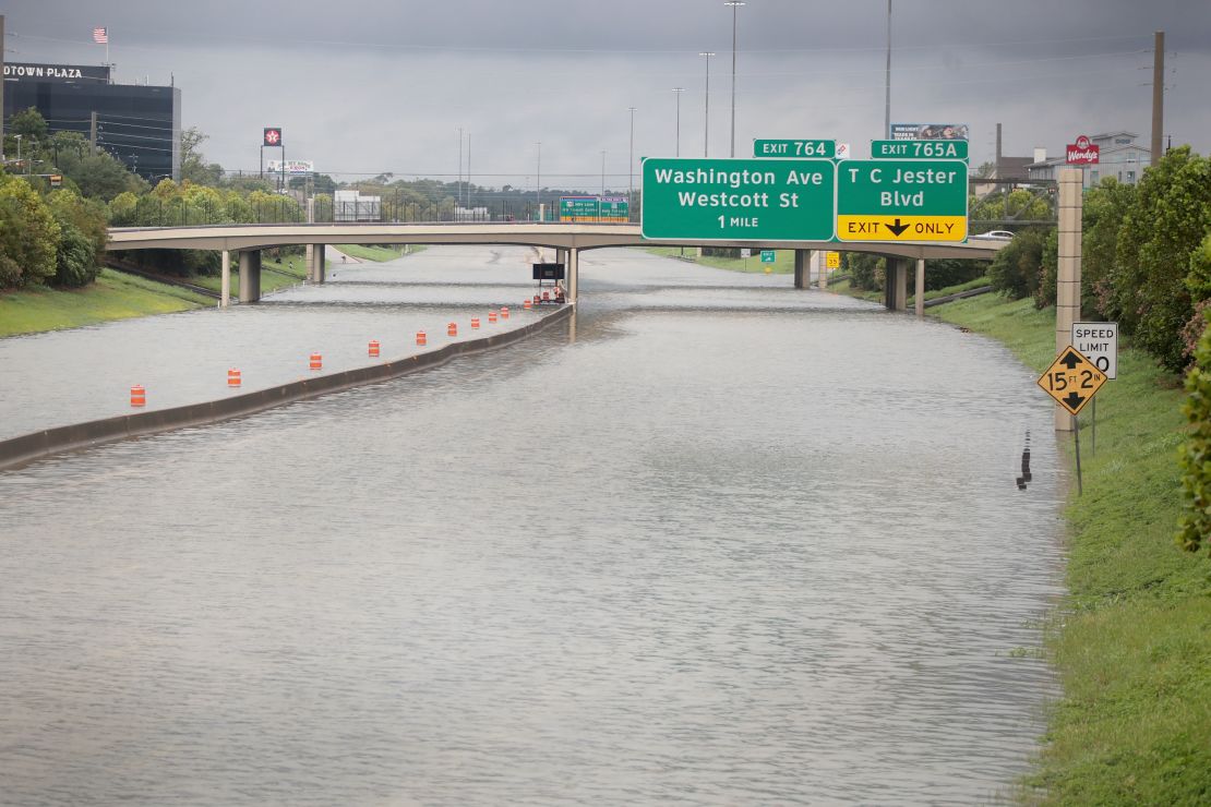 Water flows down Interstate 10 in Houston amid record flooding from Hurricane Harvey. 