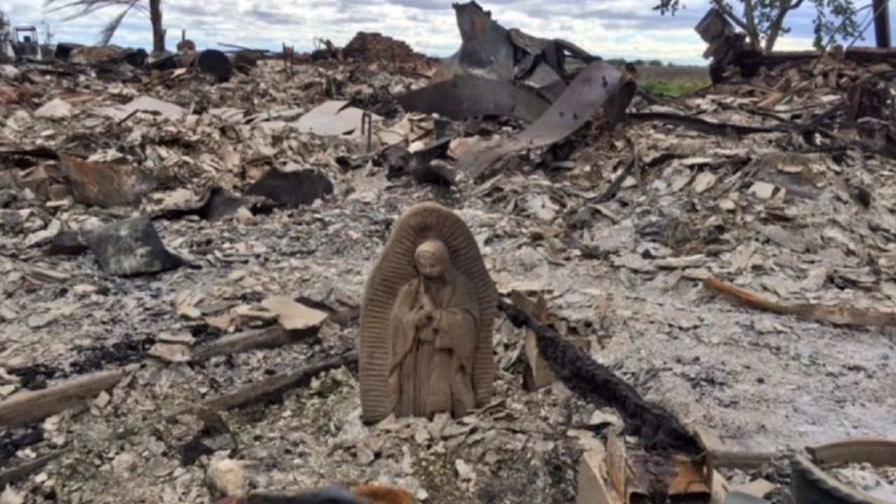 Texas woman after returning to burned home: "This statue is the only thing that survived."