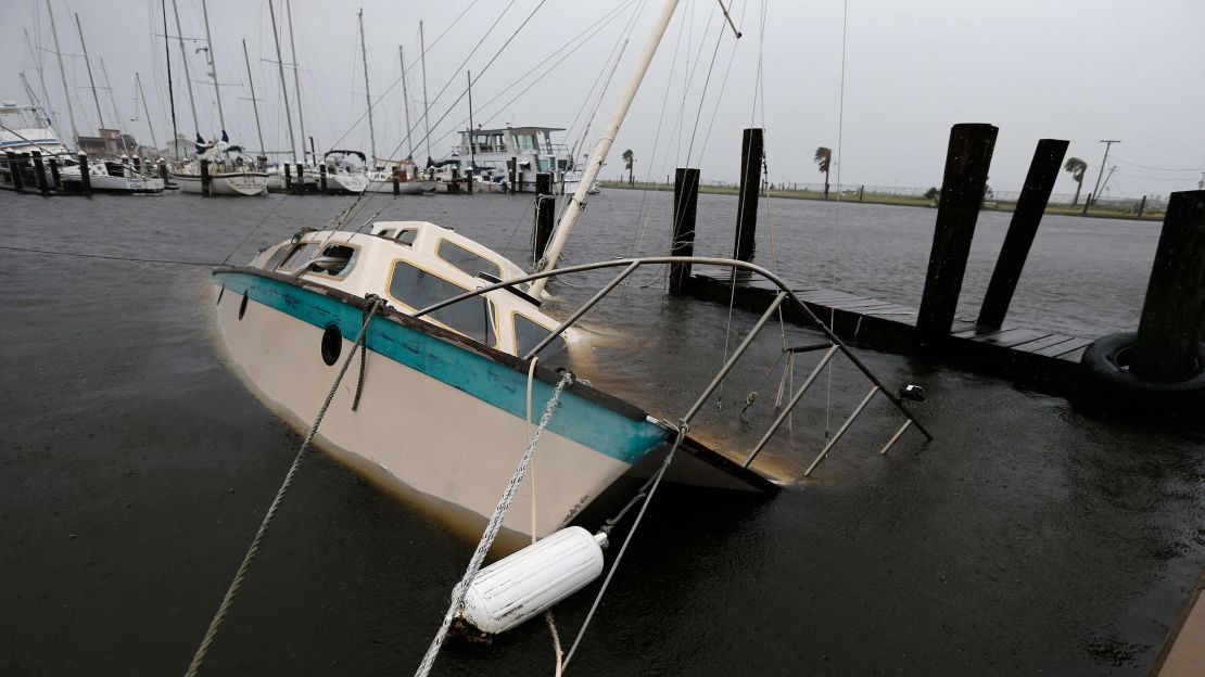 A boat lies crippled Saturday in Rockport's marina in the aftermath of Hurricane Harvey.
