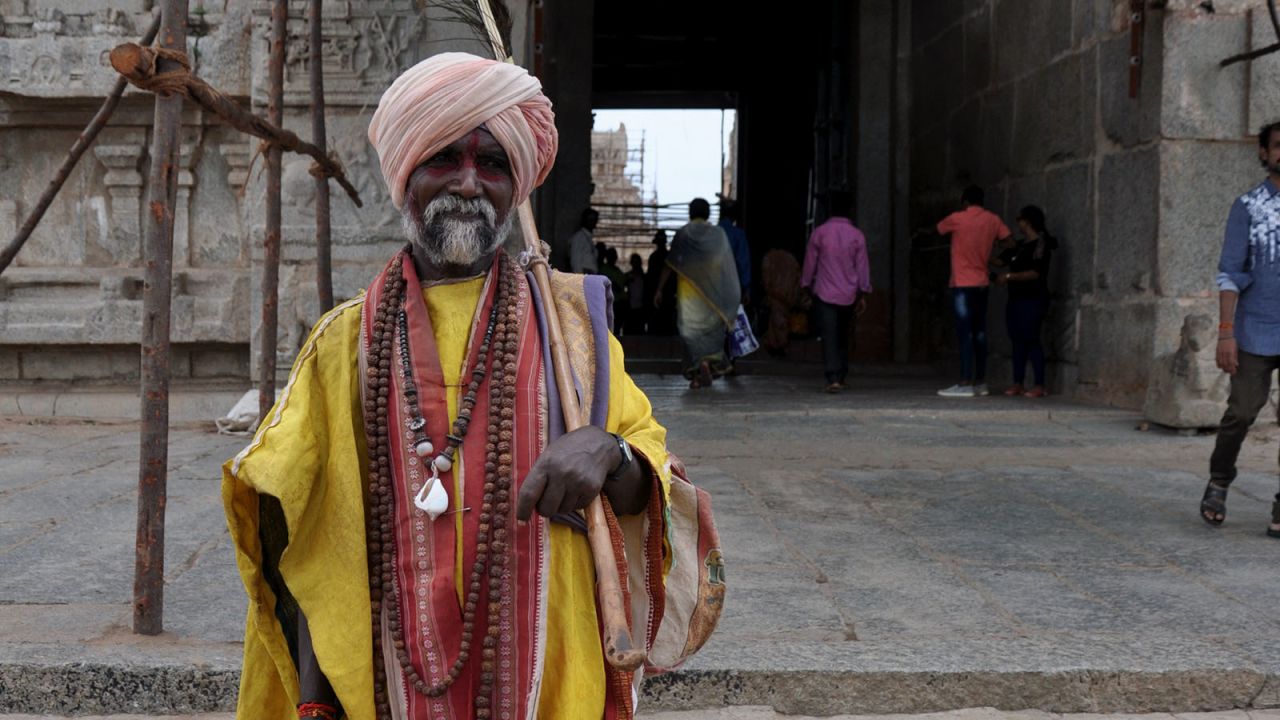 <strong>Budaga Jangam: </strong>A member of the Budaga Jangam community stands in front of the Virupaksha Temple. The Jangam are a semi-nomadic people, largely worshippers of the Hindu god Lord Shiva.