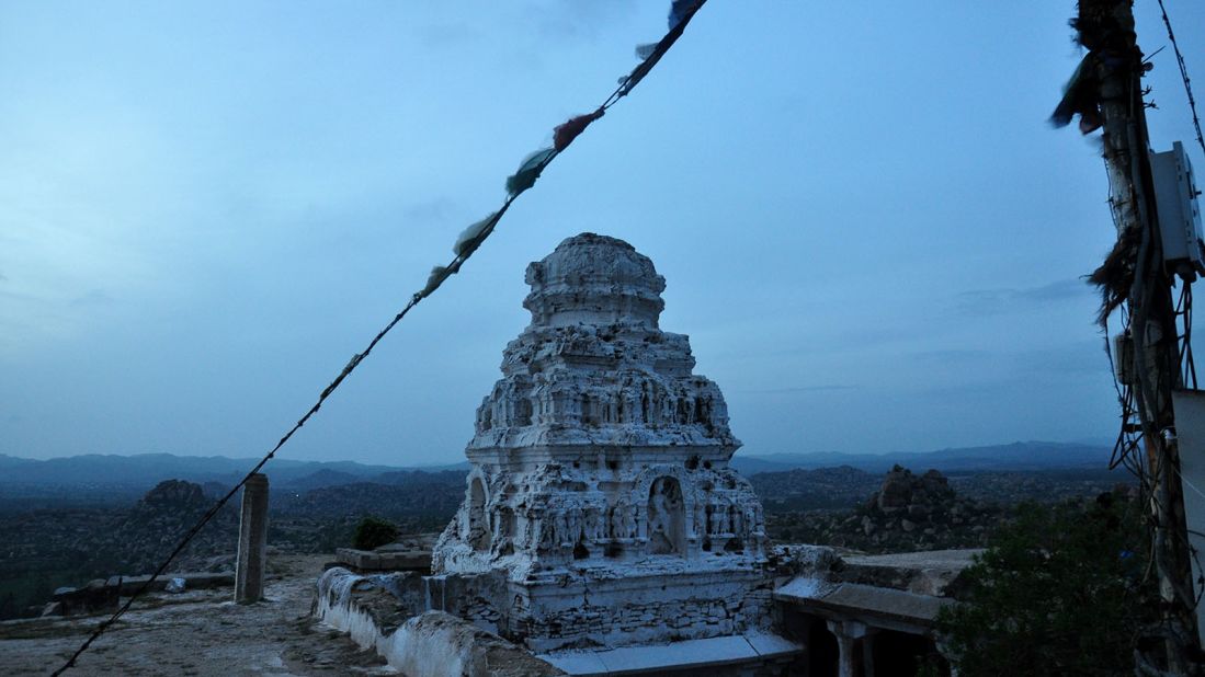 <strong>Veerabhadra Temple: </strong>The ghostly tower of the Veerabhadra Temple juts out from the summit of Matanga Hill, its stucco figures still visible despite the passage of time.
