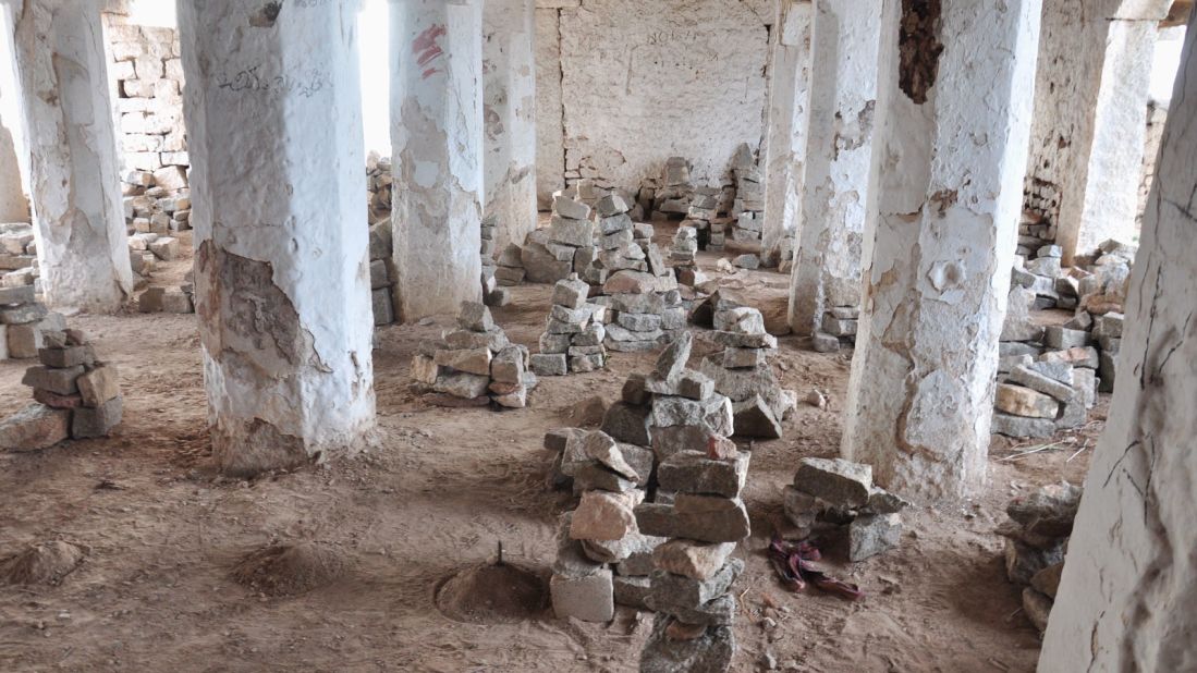 <strong>Inside Veerabhadra Temple:</strong> Rock piles and sand mounds sit inside the Veerabhadra Temple at Matanga Hill. Villagers praying for homes leave the rocks, while sand mounds are left by those seeking good harvests. 