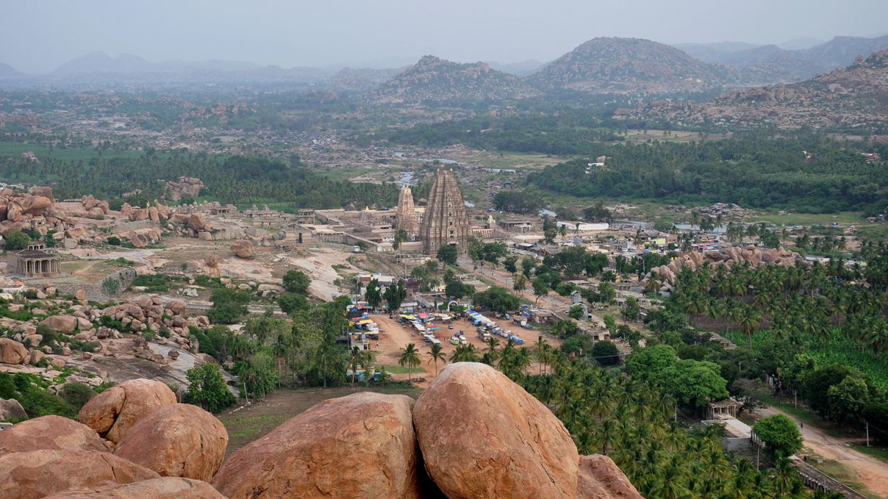 <strong>Spectacular view: </strong>A 30-minute climb up  Matanga Hill yields an unobstructed view of Virupaksha Temple and the surrounding Hampi landscape. 