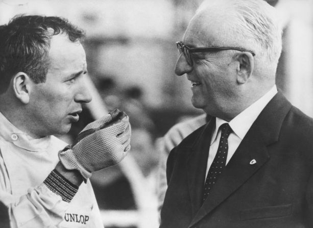 Ferrari founder, Enzo Ferrari (right) talks to John Surtees at Monza ahead of the 1963 Italian Grand Prix. The Briton, who <a href="index.php?page=&url=http%3A%2F%2Fedition.cnn.com%2F2017%2F03%2F10%2Fmotorsport%2Fjohn-surtees-dies-f1-motorcycling%2Findex.html">died in March at the age of 83</a>, won the 1964 F1 World Championship with the Ferrari team.