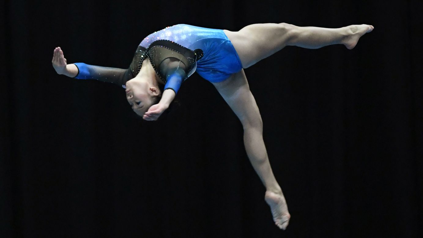 Malaysian gymnast Tan Ing Yueh competes on the balance beam during the Southeast Asian Games on Wednesday, August 23.