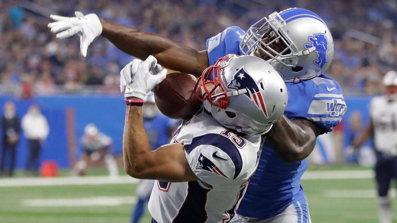 New England wide receiver Chris Hogan pulls in a 32-yard touchdown pass as he's defended by Detroit's Nevin Lawson during an NFL preseason game on Friday, August 25. 