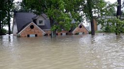 Floodwaters surround a home in Spring, Texas, on August 28.