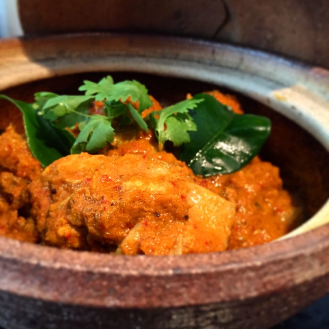 Chicken curry kapitan is made from tamarind juice, candlenuts, fresh turmeric root and belacan (shrimp paste.)