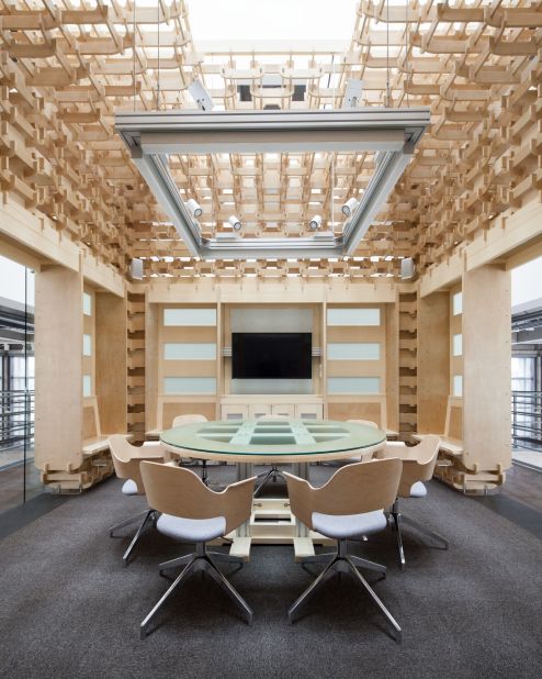 The Dougong Cube uses traditional construction methods adapted to modern materials (laminated wood) to celebrate Chinese cultural identity and ancient craftsmanship.