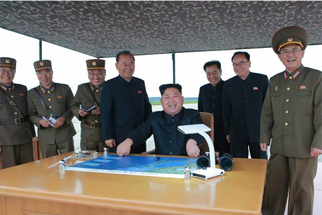 An undated photo appears to show North Korean leader Kim Jong Un overseeing a missile launch, likely to be the one launched by North Korea on August 29.