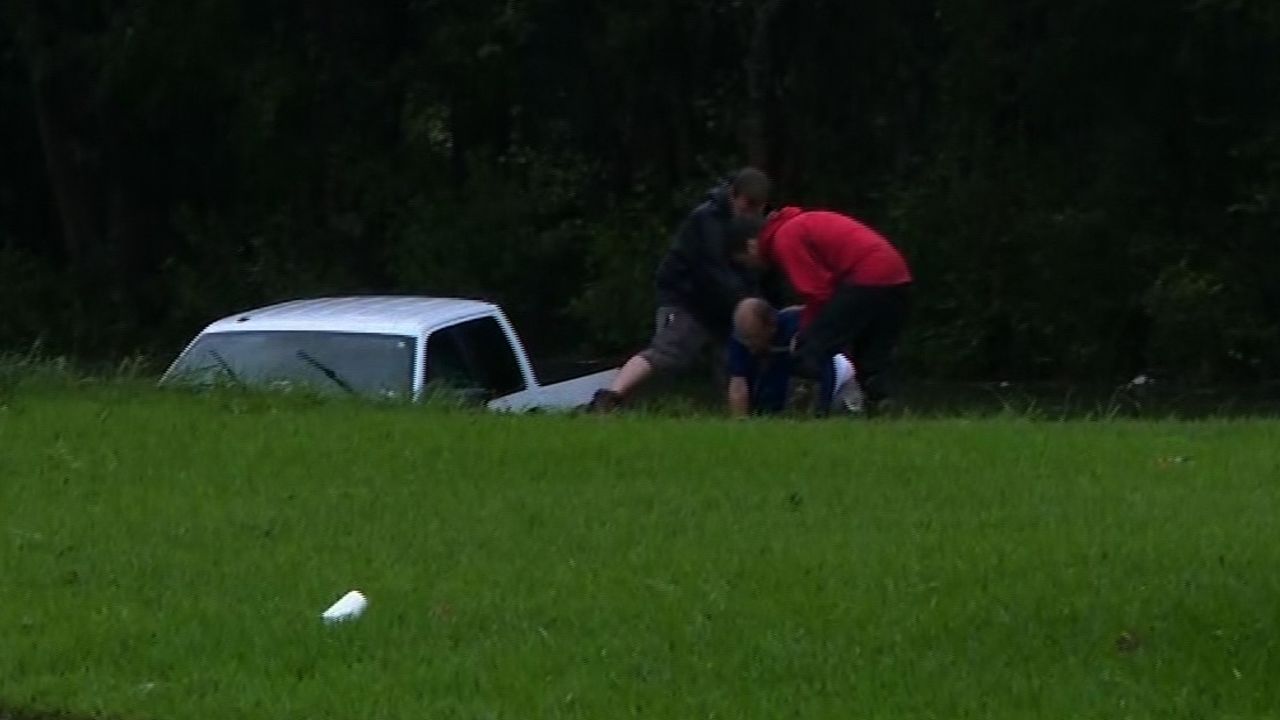 reporter man rescued harvey flood truck floating sot _00000316.jpg