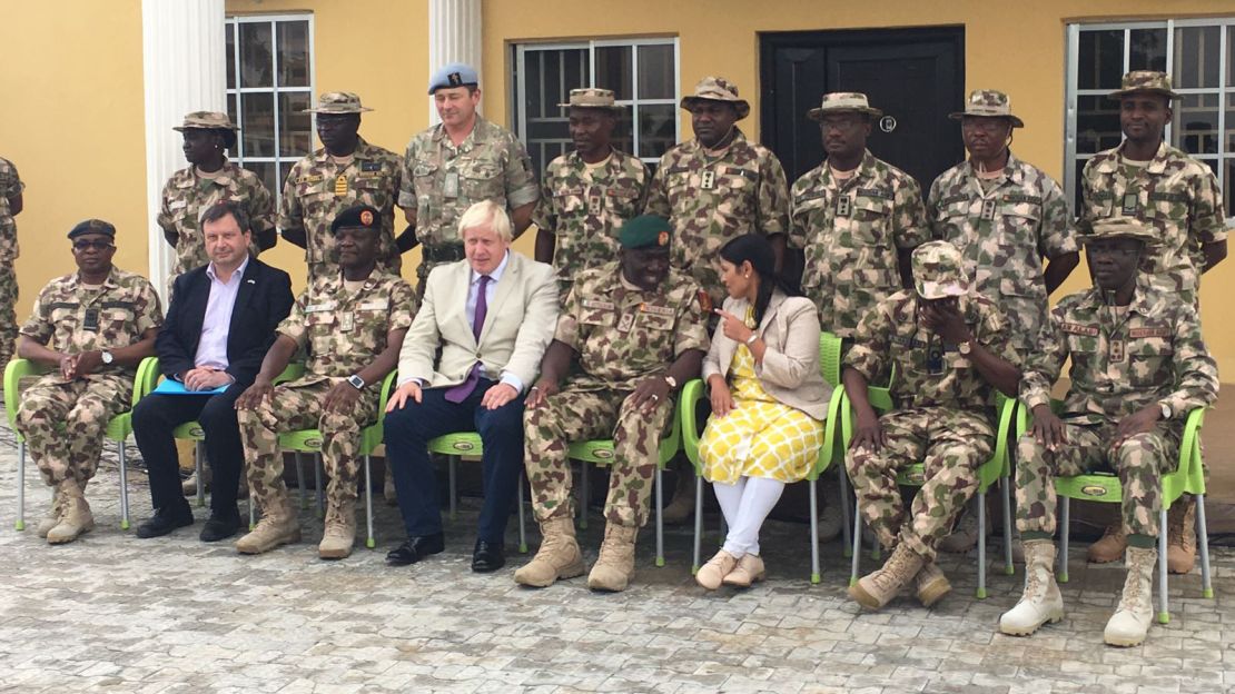 UK foreign secretary Boris Johnson and international development secretary Priti Patel with Nigerian forces on Wednesday.