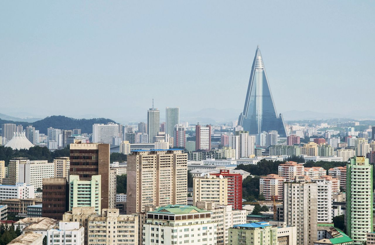 <strong>Ryugyong Hotel Tower:</strong>  A view of the Pyongyang cityscape, looking towards the infamous unfinished Ryugyong Hotel Tower from Yanggakdo Hotel. 
