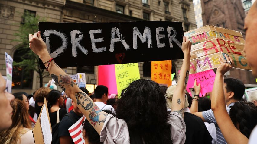 NEW YORK, NY - AUGUST 15: Dozens of immigration advocates and supporters attend a rally outside of Trump Tower along Fifth Avenue on August 15, 2017 in New York City. The activists were rallying on the five-year anniversary of President Obama's executive order, DACA - Deferred Action for Childhood Arrivals, protecting undocumented immigrants brought to the U.S. as children. Security throughout the area is high with President Donald Trump in residency at the tower, his first visit back to his apartment since his inauguration. Numerous protests and extensive road closures are planned for the area. (Photo by Spencer Platt/Getty Images)