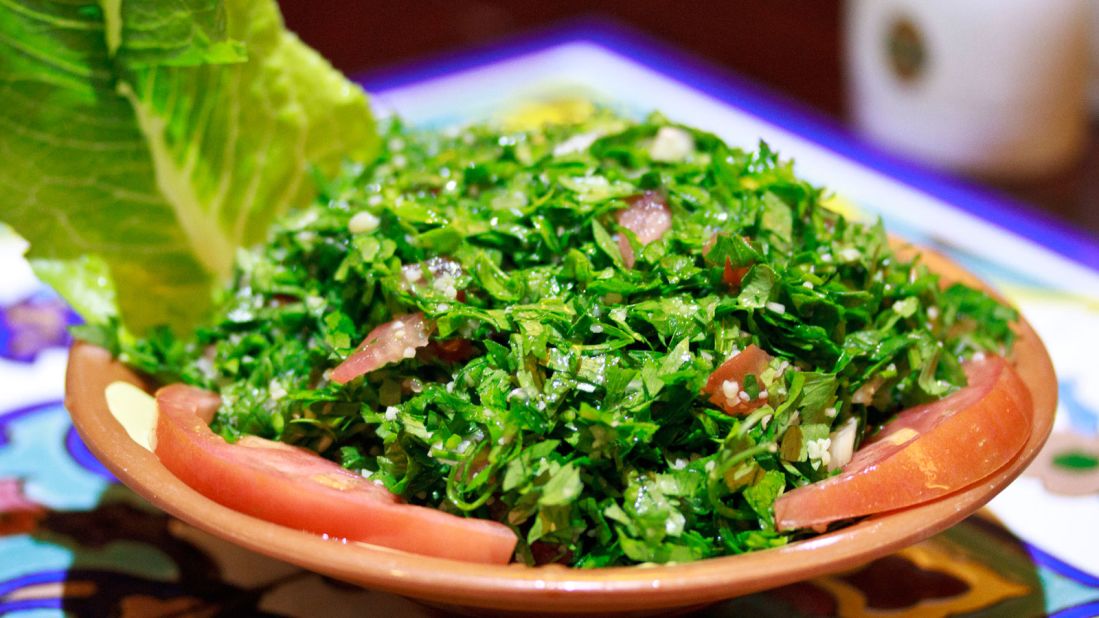 <strong>Tabouleh:</strong> A tasty combination of bulgur, parsley, mint, onion and tomatoes traditionally served as part of a mezze.