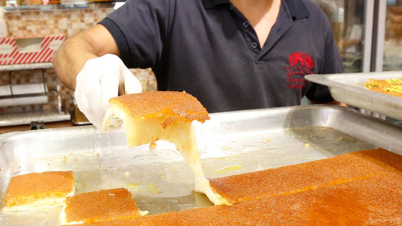 <strong>Knafeh: </strong>A delicious dessert made up of sugar-soaked cheese in a pastry crust.