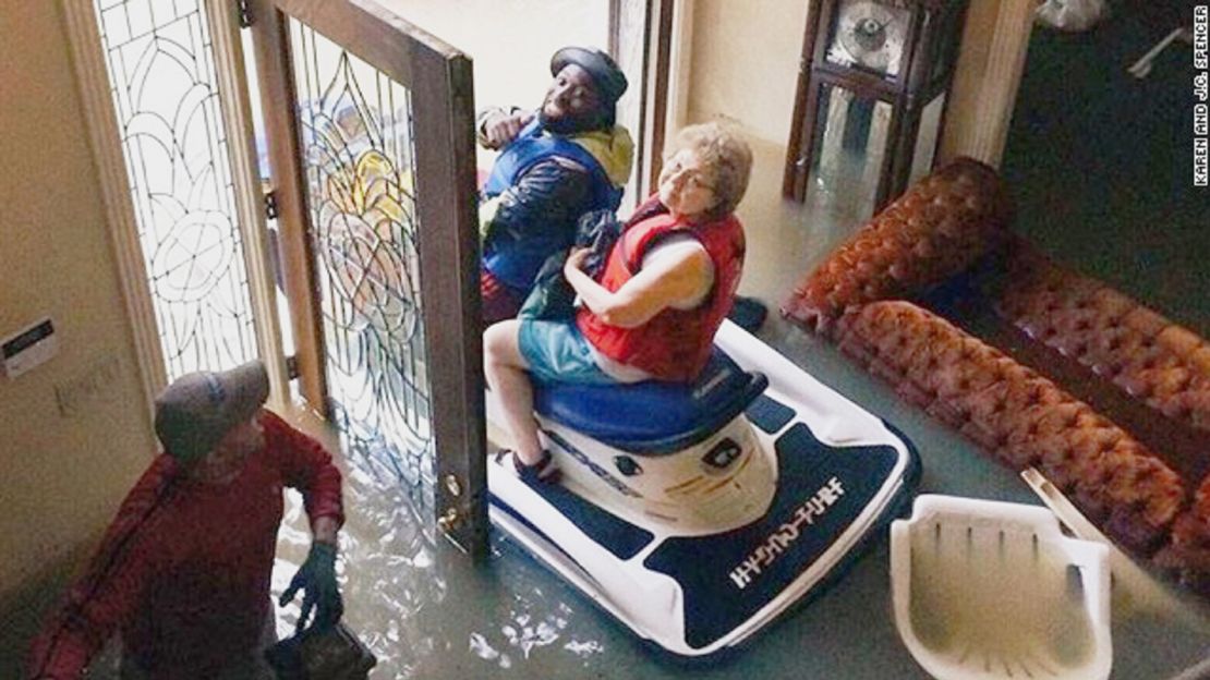 Karen Spencer being rescued from her Houston home on August 28, 2017.