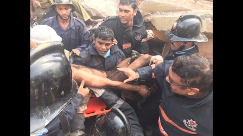 The building collapse rescue was launched as Mumbai also deals with devastating floods.