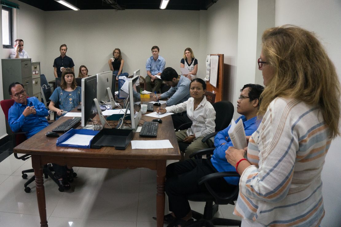 Cambodia Daily staff take part in an editorial meeting. The newspaper closed its doors after receiving a $6.3 million tax bill.