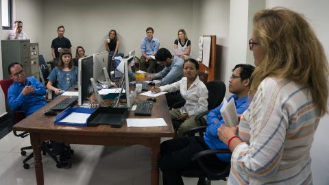 Cambodia Daily staff take part in an editorial meeting. The newspaper closed its doors after receiving a $6.3 million tax bill.