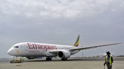 An Ethiopian Airlines Dreamliner jet is pictured ahead of its take off on April 27, 2013, at Addis Ababa's Bole International Airport. The carrier became the first airline to resume flying the Boeing 787 that were grounded worldwide three months ago due to battery problems. Saturday's flight will travel from Addis Ababa to Nairobi and is expected to return in the evening. The remaining three of Ethiopia's Dreaminers will also be retrofitted with a new battery that is contained, ensuring the flight can continue in case of malfuntion. Ethiopian Airlines CEO Tewolde Gebremariam said he was very happy to be the first airline in the world to resume flight after a three month grounding of the 50-strong fleet. Ethiopian Airlines, Africa's fastest growing carrier, is the first airline in Africa to operate the 787 Dreamliner. AFP PHOTO/JENNY VAUGHAN.        (Photo credit should read JENNY VAUGHAN/AFP/Getty Images)