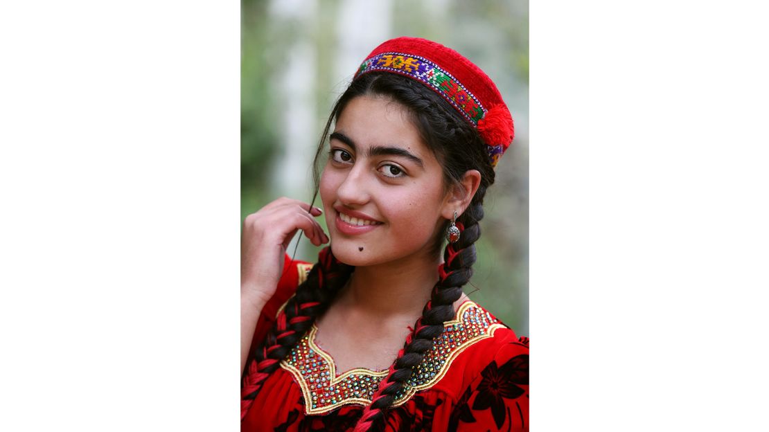 Khimushin says his photographs, including this one of a Shughnani girl in Khorog, Tajikistan,  showcase our common humanity.