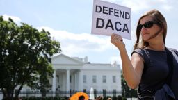 About 20 protesters demonstrate to demand immigration reform in front of the White House August 30, 2017 in Washington, DC. 