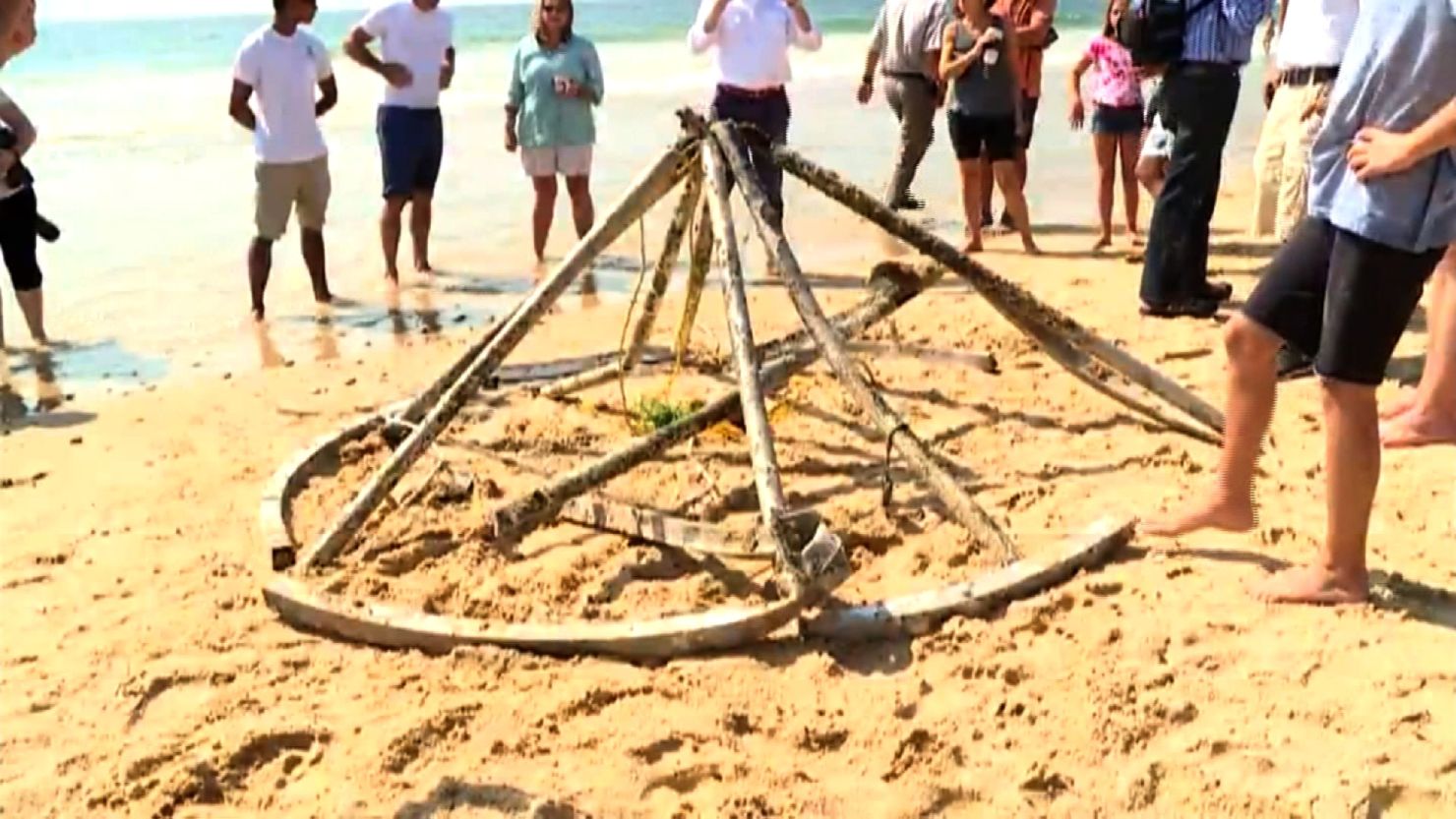 Mysterious object was uncovered on Rhode Island beach and taken away for examination 
