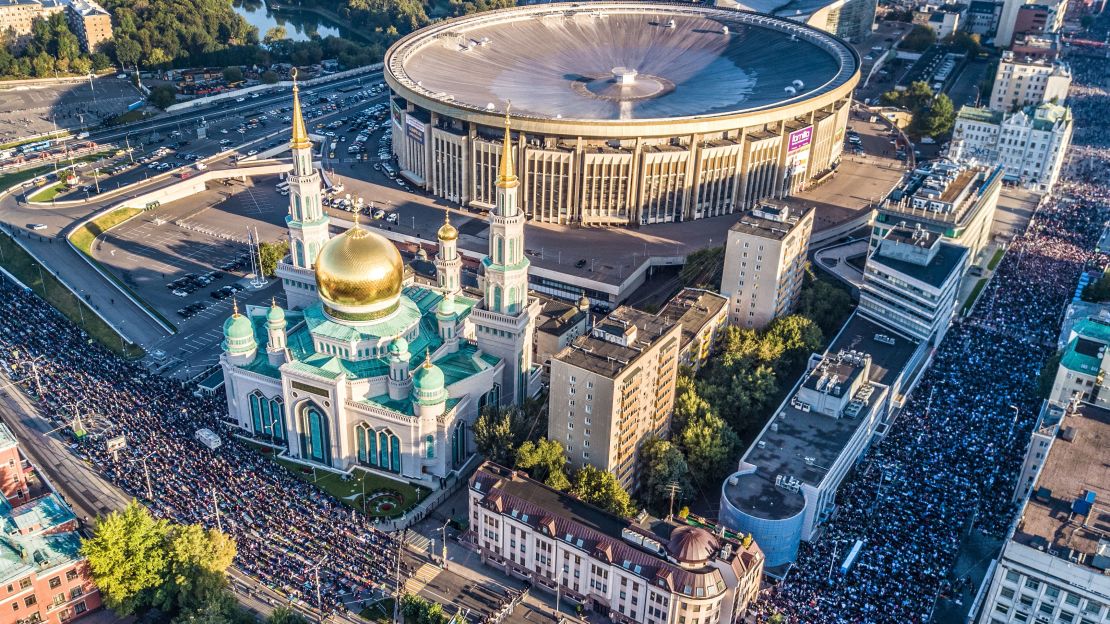 An aerial view of Russia's Muslim community praying in a street outside the Central Mosque during Eid al-Adha. 