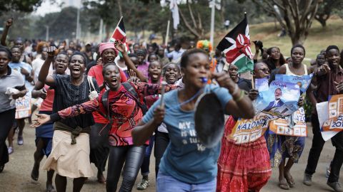 Opposition supporters celebrate Friday in Nairobi's Uhuru Park after hearing about the ruling.