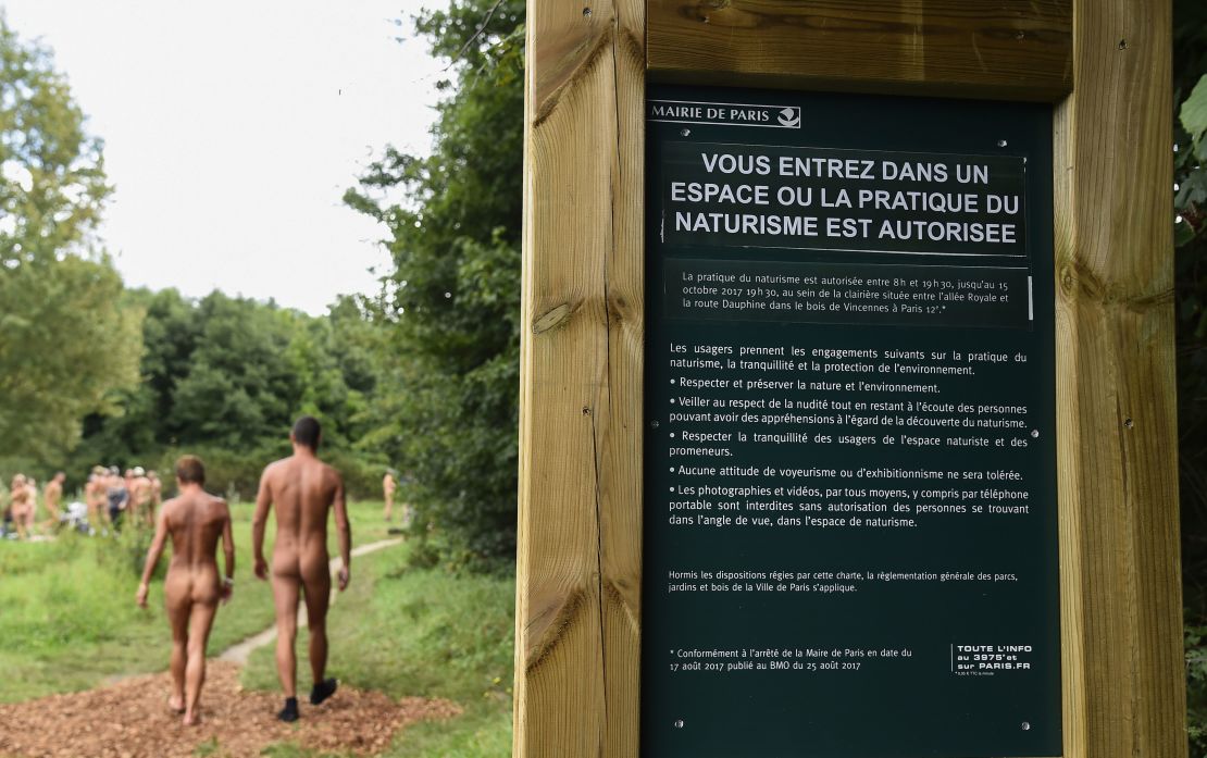 Visitors to the park are greeted with signs informing them they are entering the nudist area.