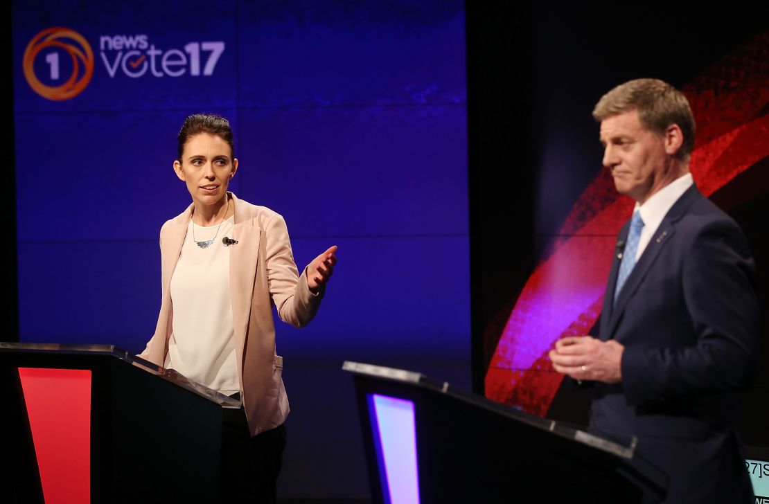 Labour leader Jacinda Ardern (L) and Prime Minsiter and Leader of the National Party Bill English (R) speak during the Vote 2017 1st Leaders Debate on August 31, 2017 in Auckland, New Zealand.