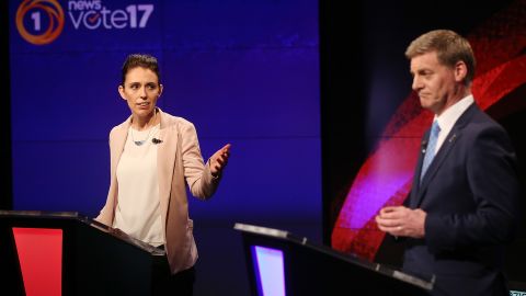 Labour leader Jacinda Ardern (L) and Prime Minsiter and Leader of the National Party Bill English (R) speak during the Vote 2017 1st Leaders Debate on August 31, 2017 in Auckland, New Zealand.