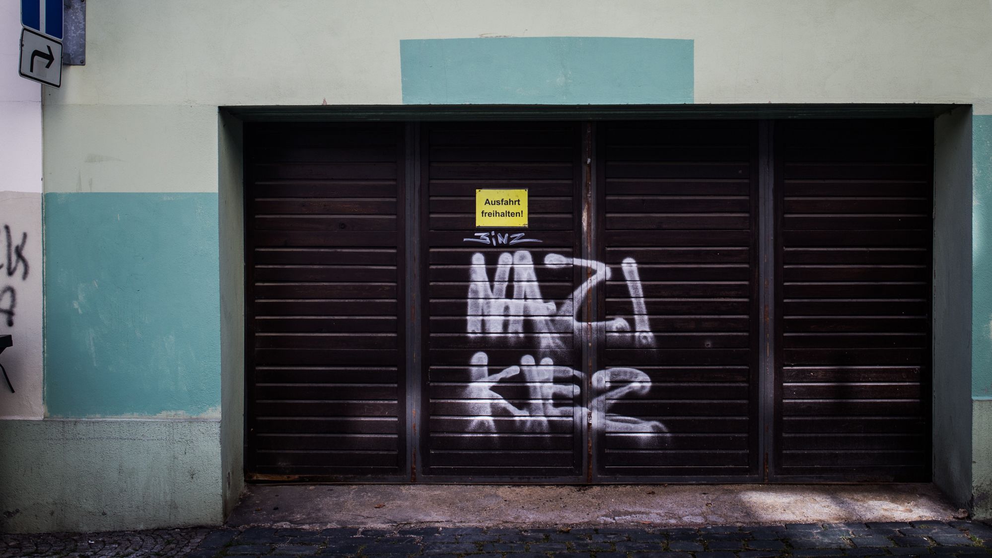 Neo-Nazi grafitti that reads "Nazi Kiez (Nazi neighborhood) is seen in Bautzen's town center.