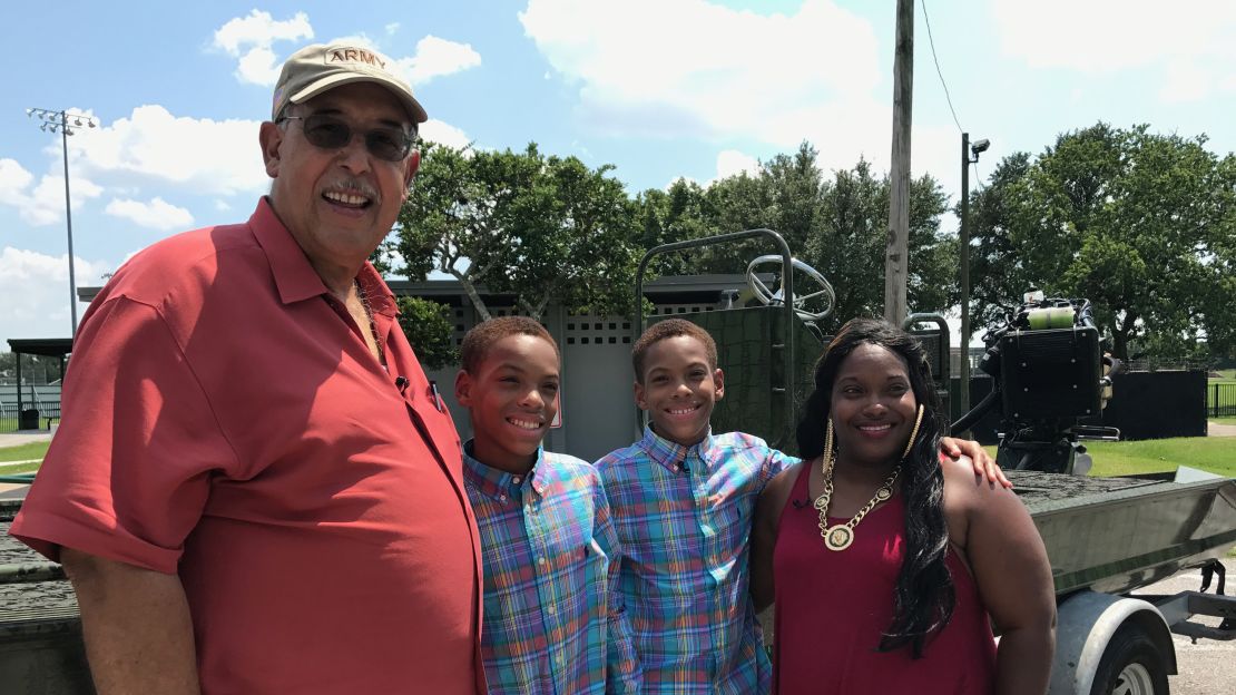 Retired Lt. Gen. Russel Honoré visits with Alexandra Wheeler and her sons, J'Mari and A'Mari.